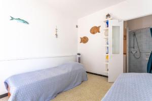 En eller flere senge i et værelse på Villa de la brune proche plages