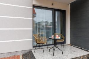 Μπαλκόνι ή βεράντα στο Seaside Apartment Rybacka with Parking by Noclegi Renters