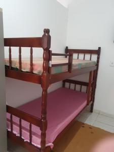 Postel nebo postele na pokoji v ubytování Kitnet Puro Dengo