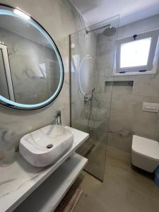 Koupelna v ubytování Hotel Portokali