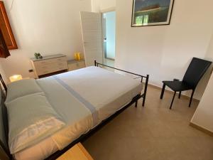Postel nebo postele na pokoji v ubytování Casa indipendente con vista mare