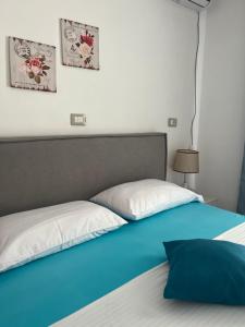 Postel nebo postele na pokoji v ubytování Hotel Portokali