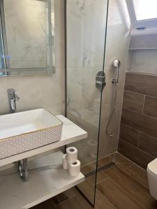 Koupelna v ubytování Hotel Portokali