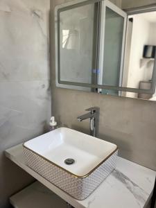 Koupelna v ubytování Hotel Portokali