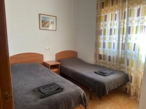 En eller flere senge i et værelse på Apartment San Pedro del Pinatar