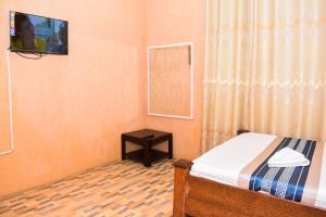 TV a/nebo společenská místnost v ubytování Best Point Hotel Zanzibar