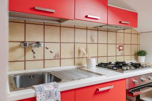 Kuchyň nebo kuchyňský kout v ubytování Italian Experience-Casa Del Corso