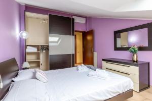 Postel nebo postele na pokoji v ubytování Italian Experience-Casa Del Corso