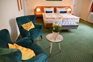 Ένα ή περισσότερα κρεβάτια σε δωμάτιο στο Hotel Waldperle