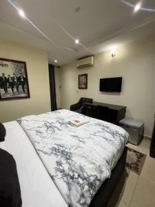 Postel nebo postele na pokoji v ubytování HOD Apartments