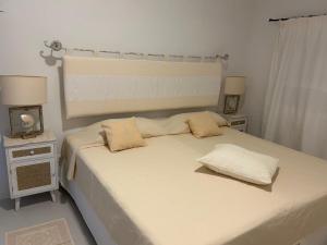 Postel nebo postele na pokoji v ubytování Casa Marianna + 2 fotografie