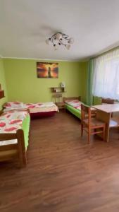 Postel nebo postele na pokoji v ubytování Pokoje u Renatki