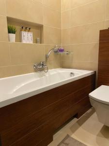 Kúpeľňa v ubytovaní Apartament Jantarowa