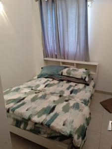 Postel nebo postele na pokoji v ubytování Shan Homestay