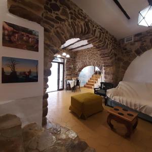 Posezení v ubytování Casa rural rústica "EL COLMENAR" para parejas, familias o amigos a la montaña