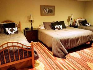 Giường trong phòng chung tại Cozy Family Accommodation for Five Guests in Montezuma, Iowa