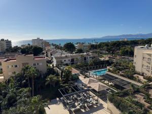 an aerial view of a resort with a pool at Hotel Paradiso Garden in Playa de Palma