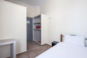 Hotel Mauritania客房内的一张或多张床位