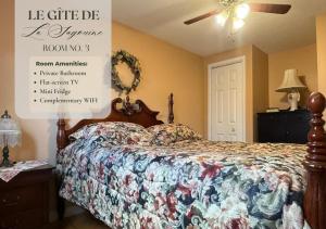 Le Gîte De La Sagouine客房内的一张或多张床位