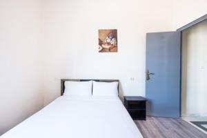 Hotel Mauritania客房内的一张或多张床位