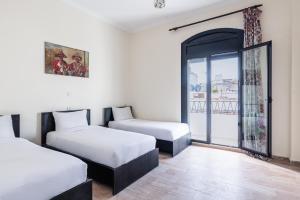 Hotel Mauritania客房内的一张或多张床位