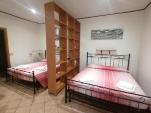 A bed or beds in a room at Da Adriana al vaticano Még 27 kép