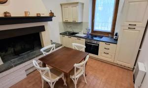 Kuchyň nebo kuchyňský kout v ubytování La Kascina Suite & Rooms