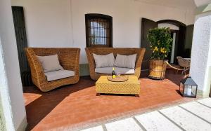 Posezení v ubytování La Kascina Suite & Rooms