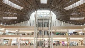 a large shopping mall with a large ceiling at Cozy Tanglin Studio at SuperMall Mansion, Pakuwon Mall West Surabaya - by Le Ciel Hospitality in Surabaya