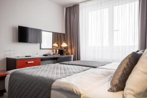 Postel nebo postele na pokoji v ubytování Hotel Vista