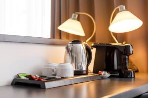 Příslušenství pro přípravu čaje a kávy v ubytování Hotel Vista