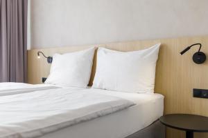 Postel nebo postele na pokoji v ubytování Hotel Vista