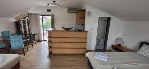 Kuchyň nebo kuchyňský kout v ubytování Apartman Kosta