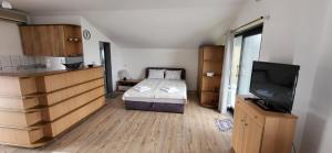 Postel nebo postele na pokoji v ubytování Apartman Kosta