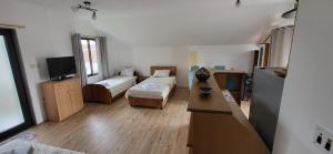 Postel nebo postele na pokoji v ubytování Apartman Kosta