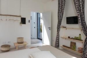 Postel nebo postele na pokoji v ubytování Saso' - Casa di charme e relax