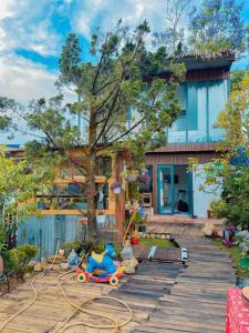 a house being remodeled with a garden hose at Dốc home in Da Thien