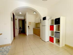 Kuchyň nebo kuchyňský kout v ubytování Apartment Lucille in center of Rabac