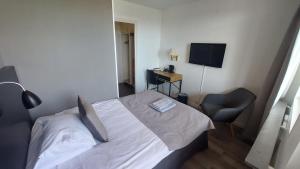 Μια τηλεόραση ή/και κέντρο ψυχαγωγίας στο Hotel Bishops Arms Mora