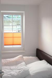 Postel nebo postele na pokoji v ubytování Fewo Kleine Meeresbrise / Villa Christine