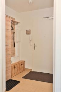 a room with a closet with a white door at Ferienwohnung Nautilus in Ostseebad Nienhagen