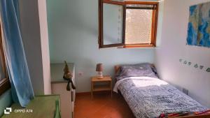 Postel nebo postele na pokoji v ubytování Can Cargol