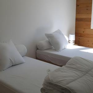 Postel nebo postele na pokoji v ubytování La clé du Vercors