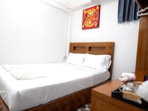 Postel nebo postele na pokoji v ubytování I Talay phuket