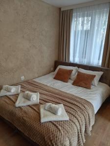 Postel nebo postele na pokoji v ubytování Apartman Jež