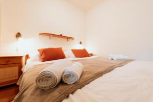 Ένα ή περισσότερα κρεβάτια σε δωμάτιο στο Horský hotel Bartoška