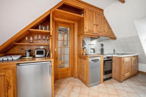 Kuchyň nebo kuchyňský kout v ubytování Haus Westsee Og Friesenstil