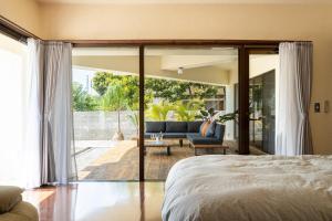 Ένα ή περισσότερα κρεβάτια σε δωμάτιο στο Alumina アルミナ