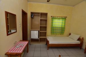 Postel nebo postele na pokoji v ubytování Anonymous Homestay