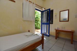 Postel nebo postele na pokoji v ubytování Anonymous Homestay